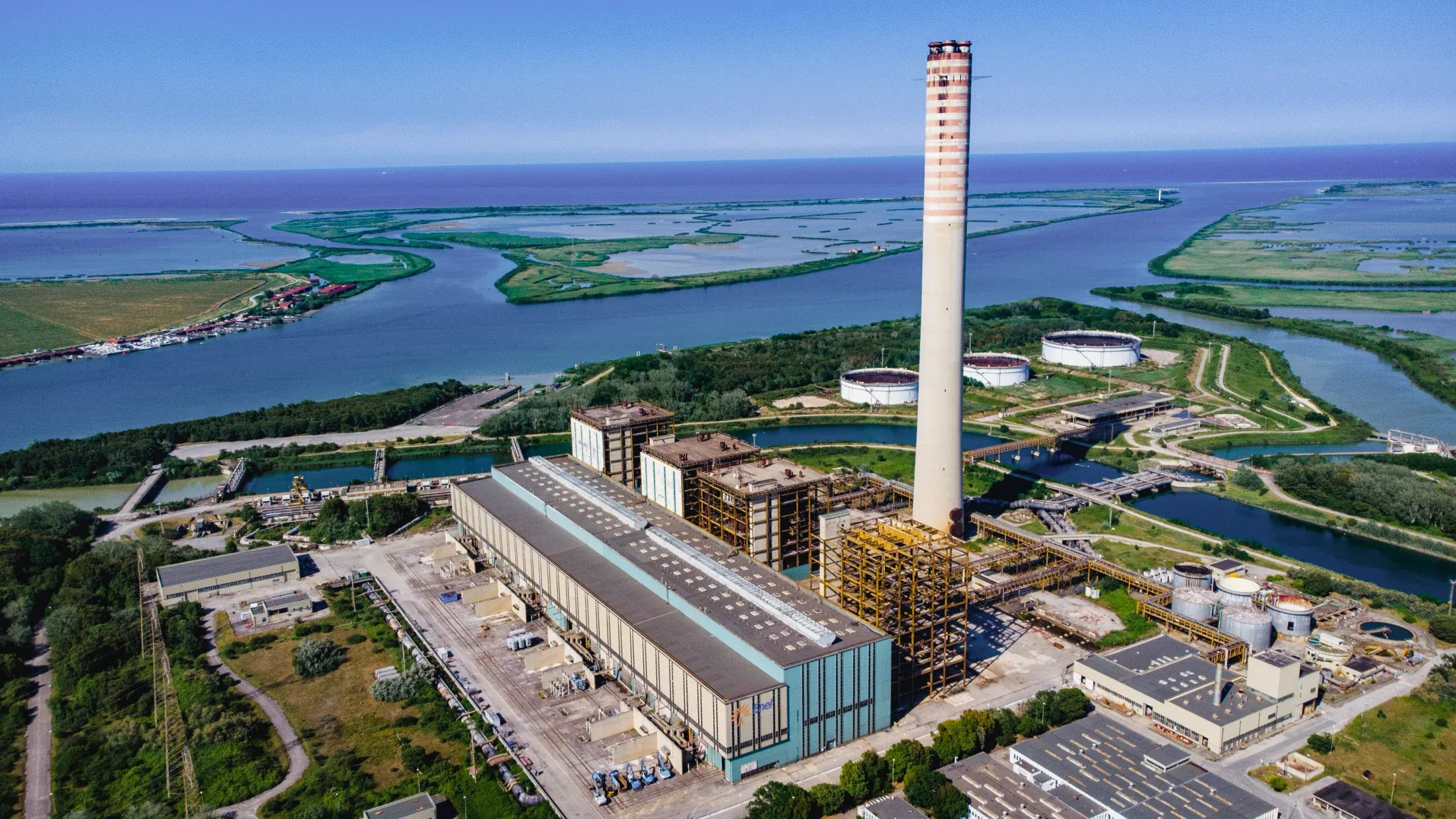 A large centralized treatment or recovery facility photographed from above, illustrating the scale of concentrated infrastructure.